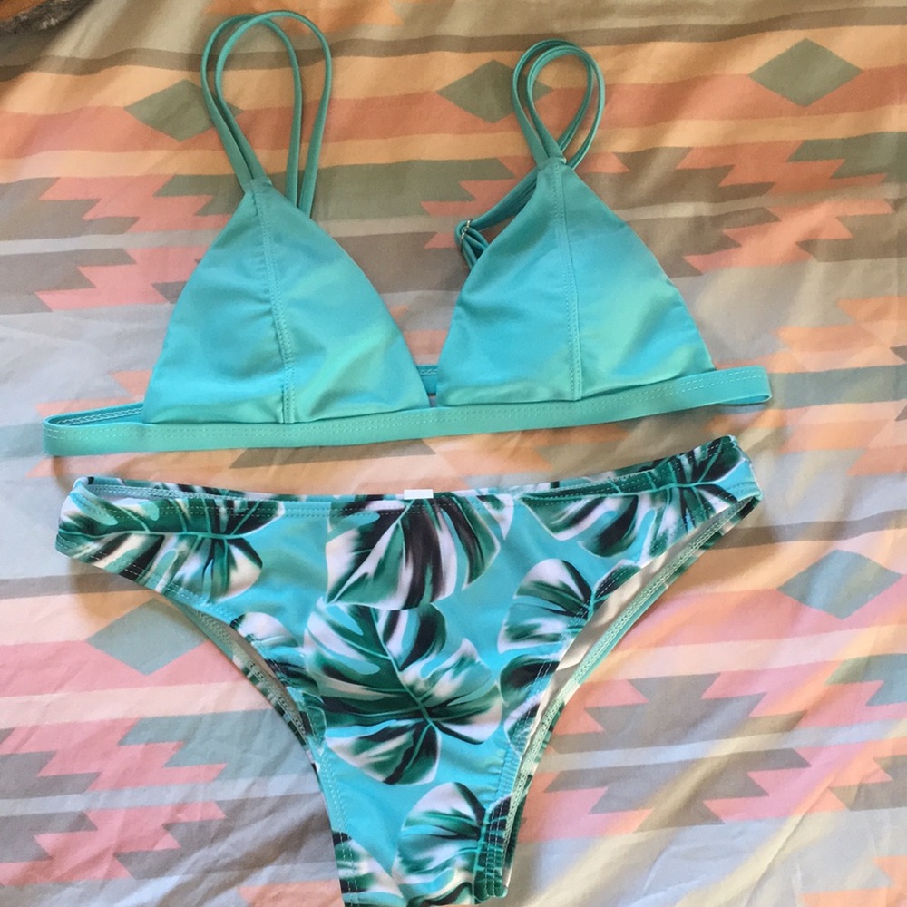 Really pretty light blue bathing suit.